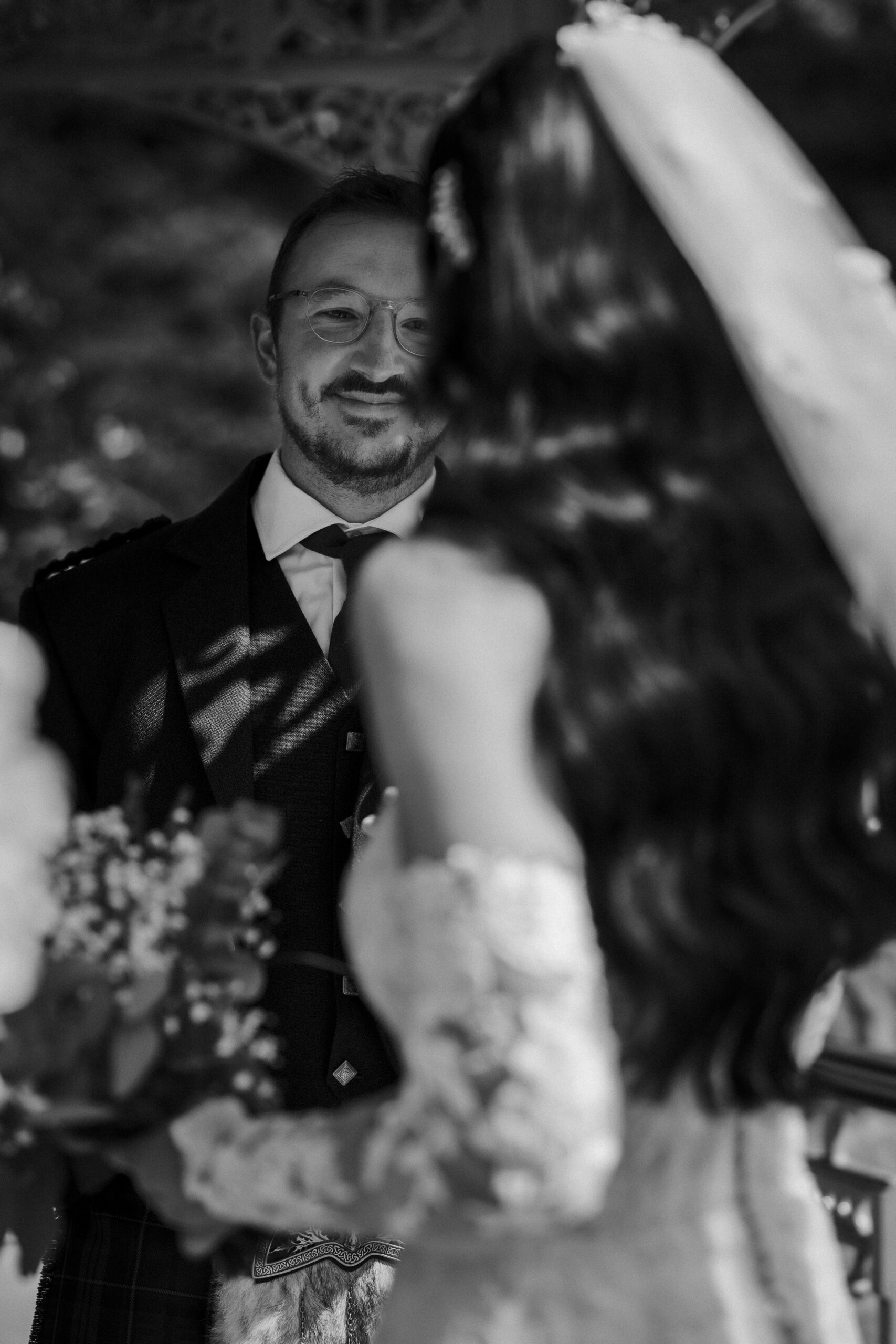 Groom seeing his bride for the first time at their Glasgow wedding.