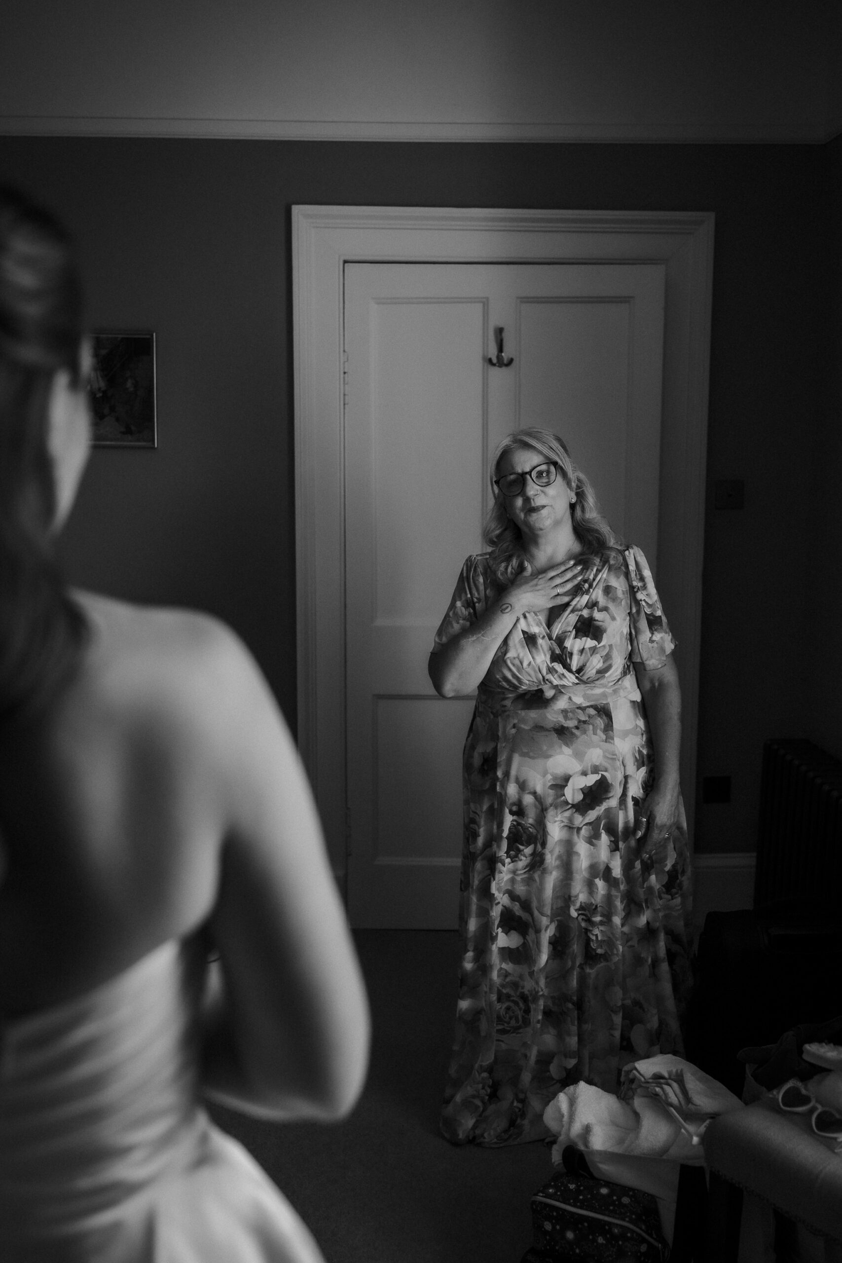 First look between bride and mother before a ceremony in Scotland.